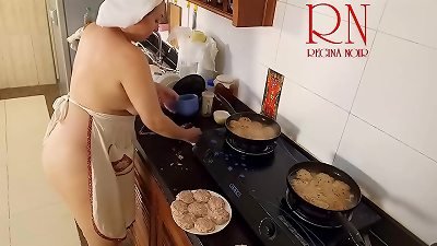 nudist housewife Regina Noir cooks at the kitchen. naked maid. bare housewife. s3